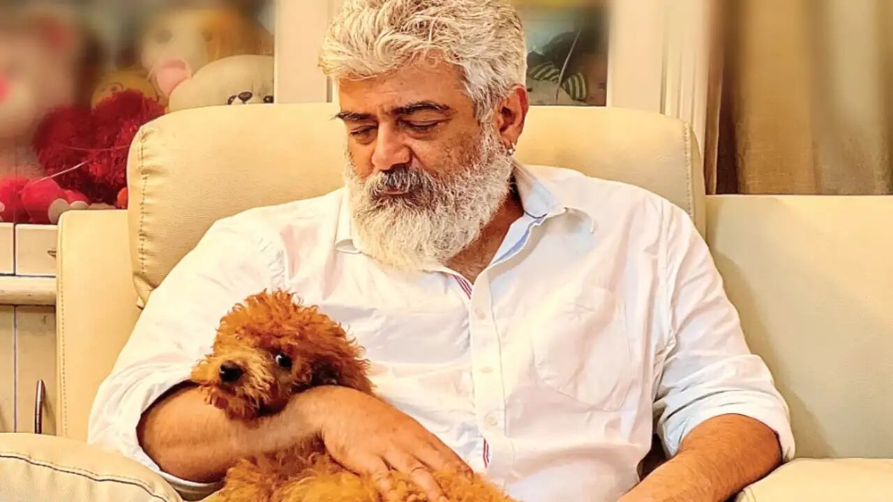 Ajith Kumar looks handsome in his new avatar as he poses with furry pet for a magazine cover