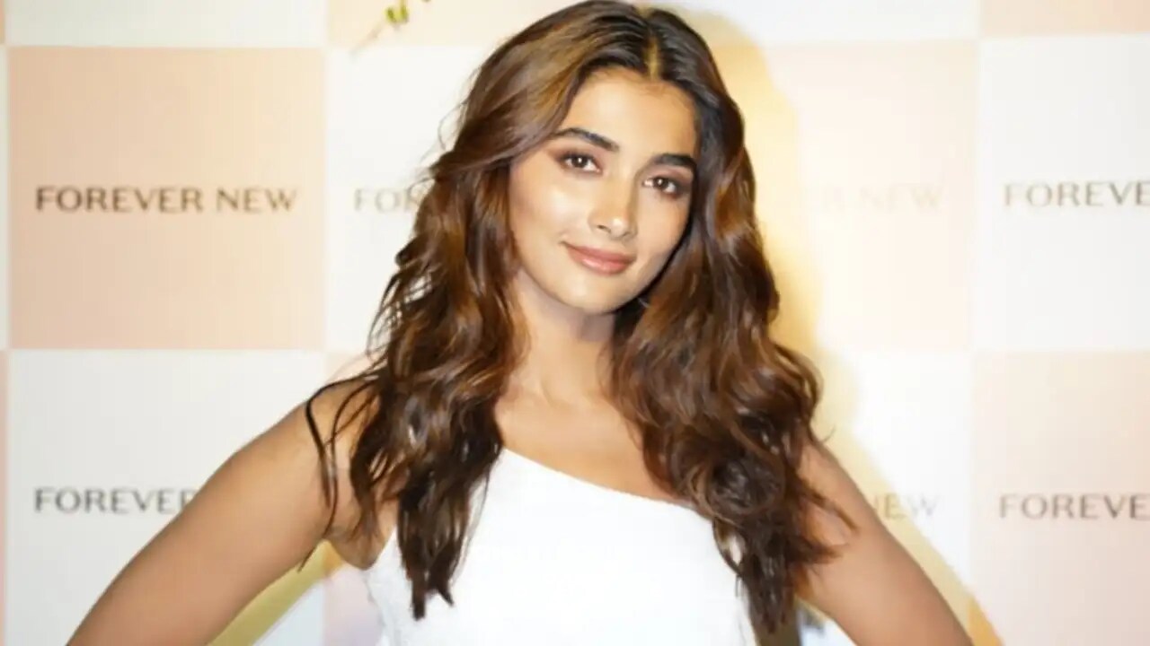 Pooja Hegde looks breathtaking in a white gown as he attends an event in Mumbai