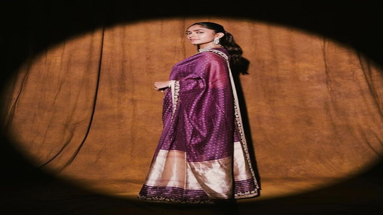 Mrunal Thakur shows the regal Indian route in violet banarsi silk saree worth Rs. 21K