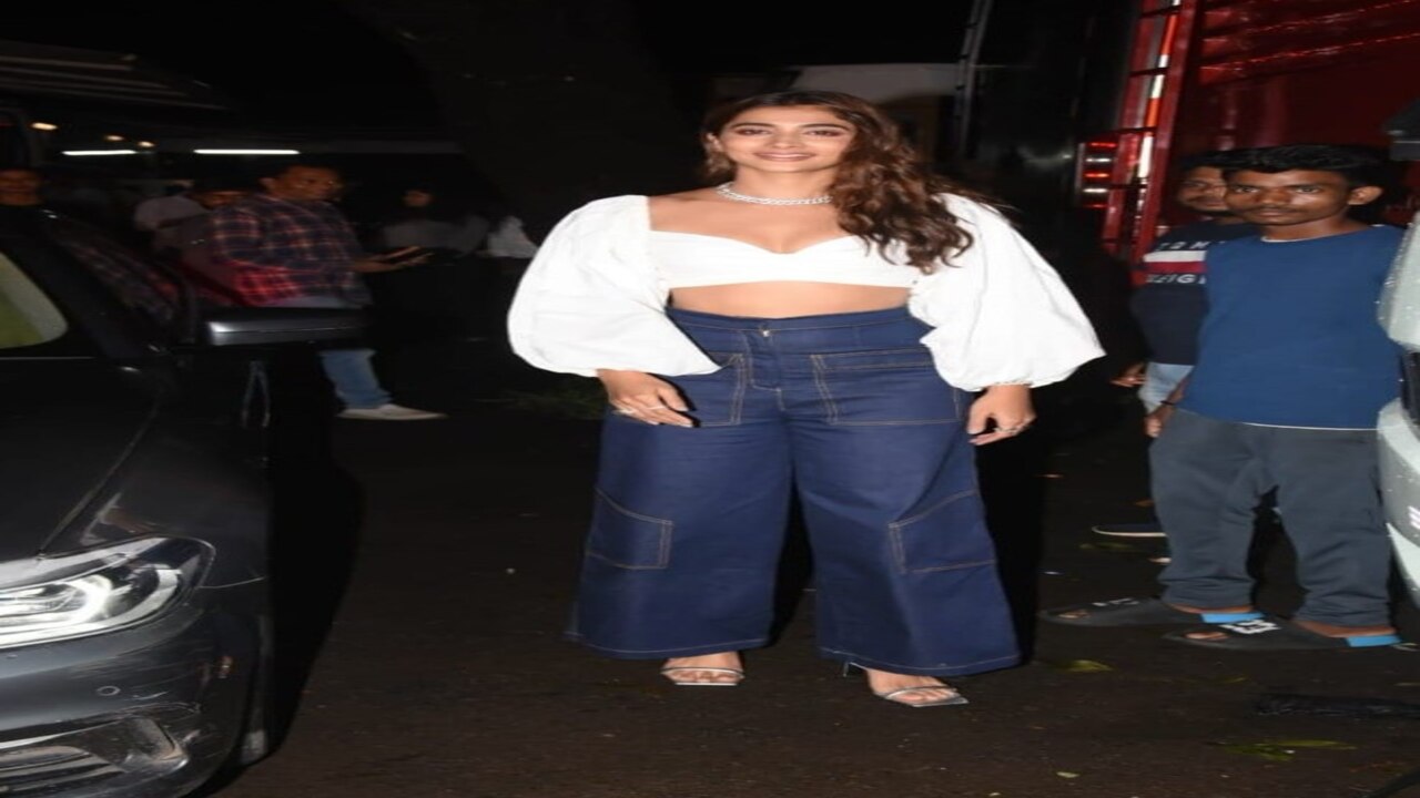 Pooja Hegde serves up another glam look in a sexy puffy sleeves crop top and flared cargo pants