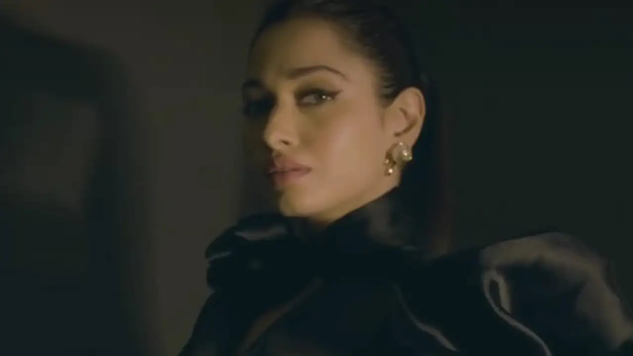 Tamannaah Bhatia looks gorgeous in a black satin top and shimmer trousers