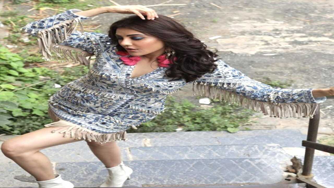Kajal Aggarwal looks sizzling hot as she poses in mirror work embellished dress by Arpita Mehta