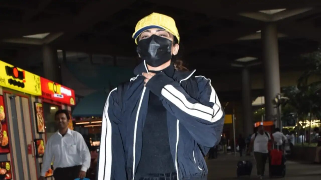 Rashmika Mandanna looks cozy in black athleisure as she poses for the paparazzi