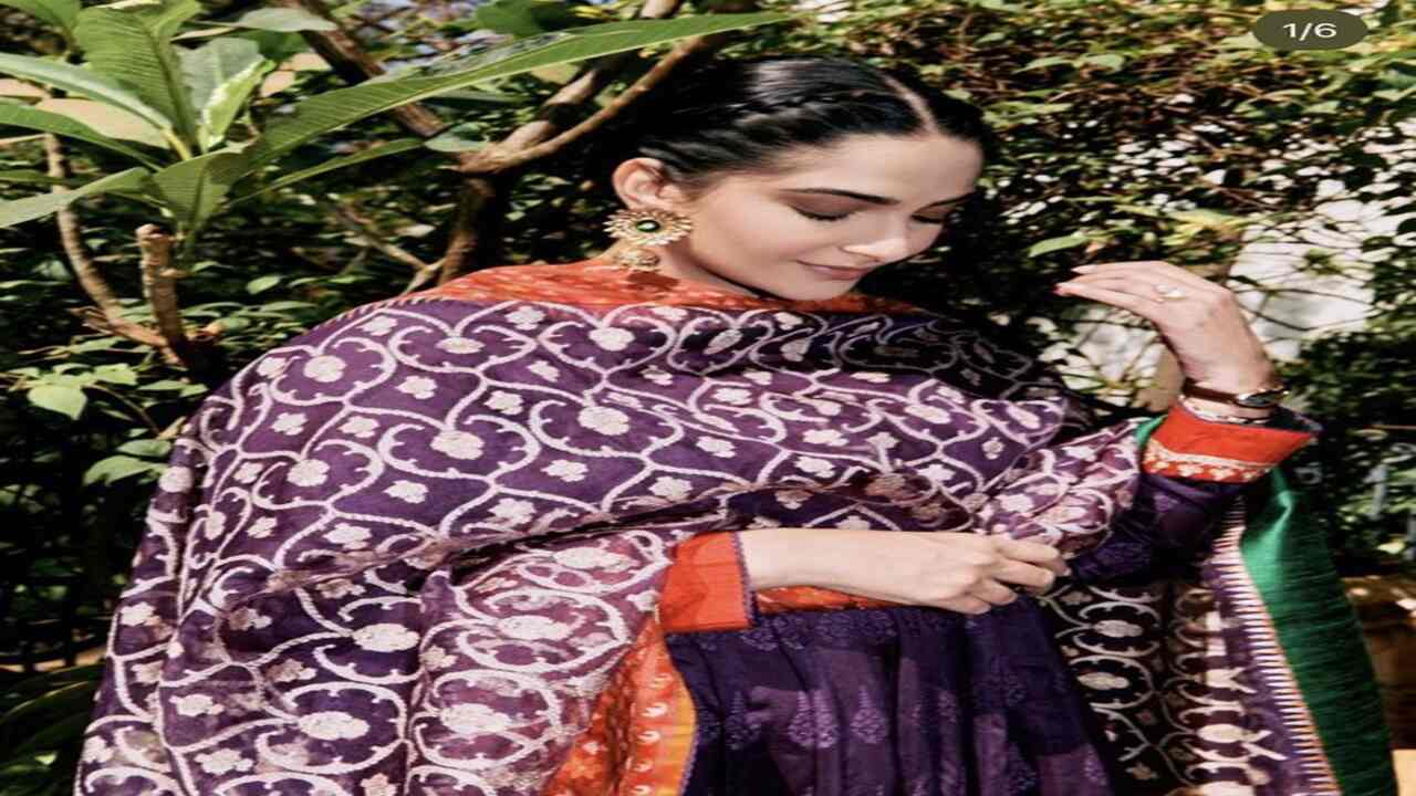Sonam donned a purple Anarkali kurta with thick borders in a striking orange colour