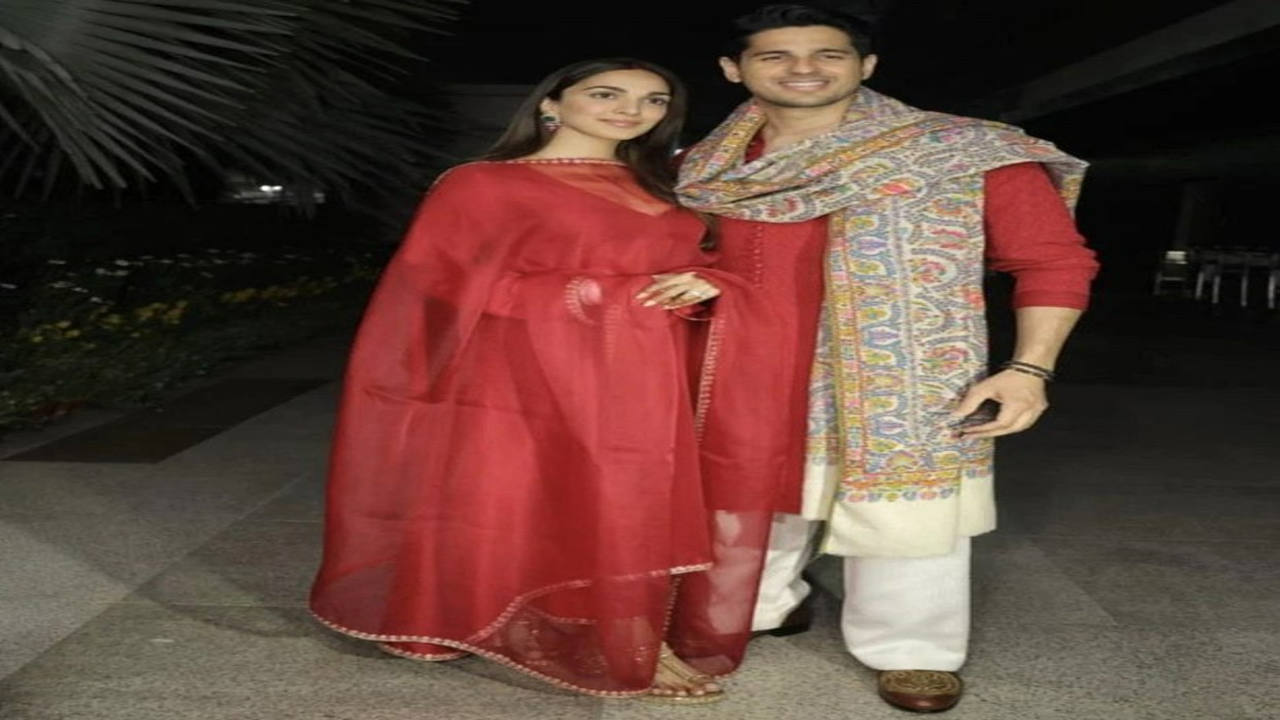 Newlywed couple Sidharth Malhotra and Kiara Advani looked dreamy in red Manish Malhotra ensembles